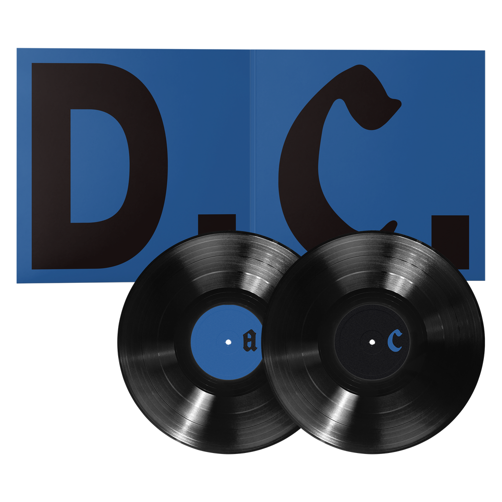 Fontaines DC Dopamine Chamber music bundle. Two black vinyl records with blue center labels are displayed in front of an open blue album cover featuring large black letters.